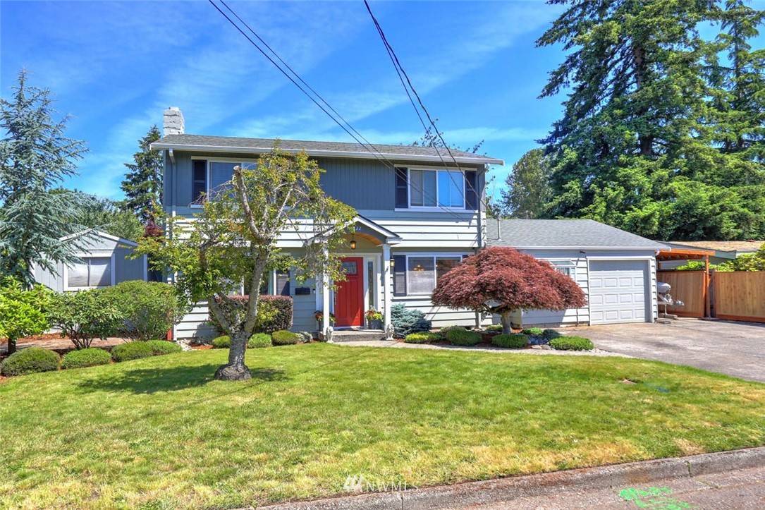 3522 Northeast 10th Place Renton, WA 98056 - Photo 33 of 34 a view of a house with a big yard and potted plants