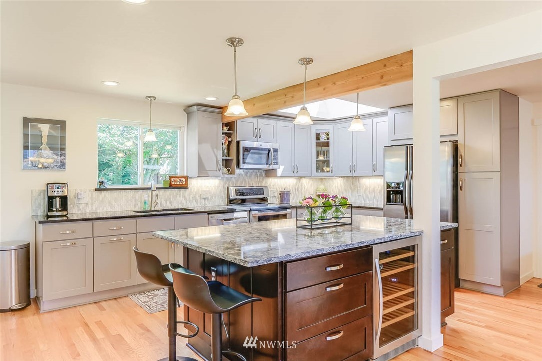3522 Northeast 10th Place Renton, WA 98056 - Photo 5 of 34 a kitchen with a center island appliances and cabinets