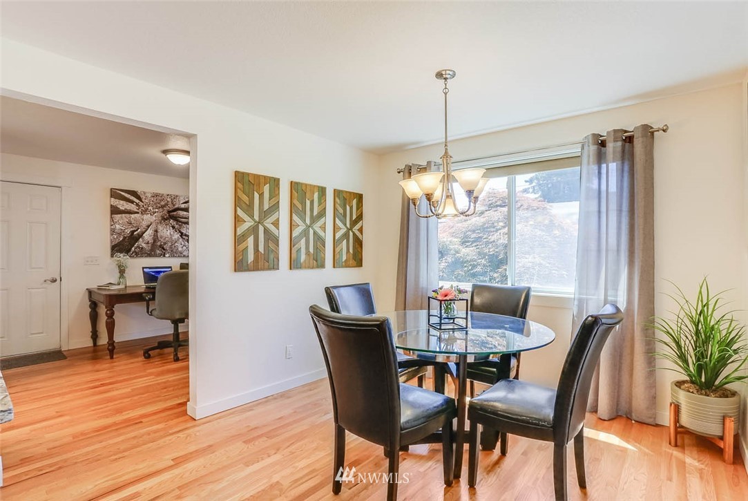 3522 Northeast 10th Place Renton, WA 98056 - Photo 9 of 34 a dining room with furniture window wooden floor