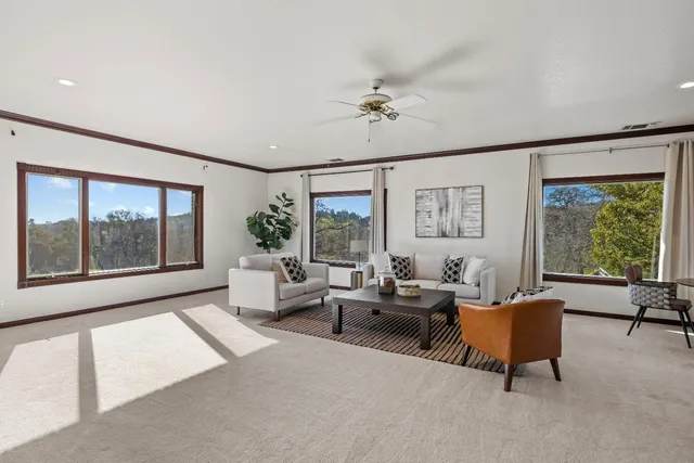 a view of a barn in the middle of a yard