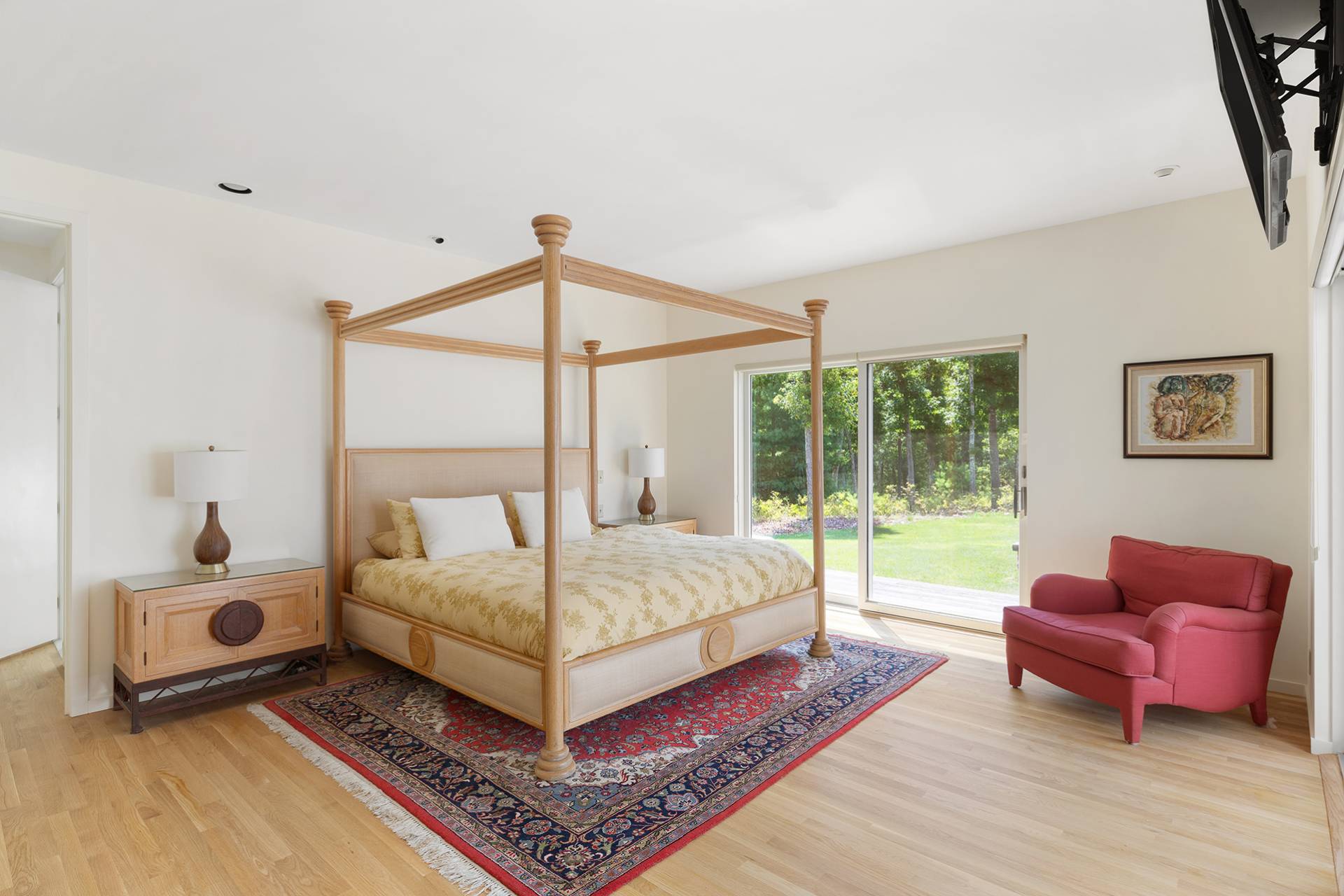 147 Old Northwest Road East Hampton, NY 11937 - Photo 12 of 33 a bedroom with a bed couch and a window