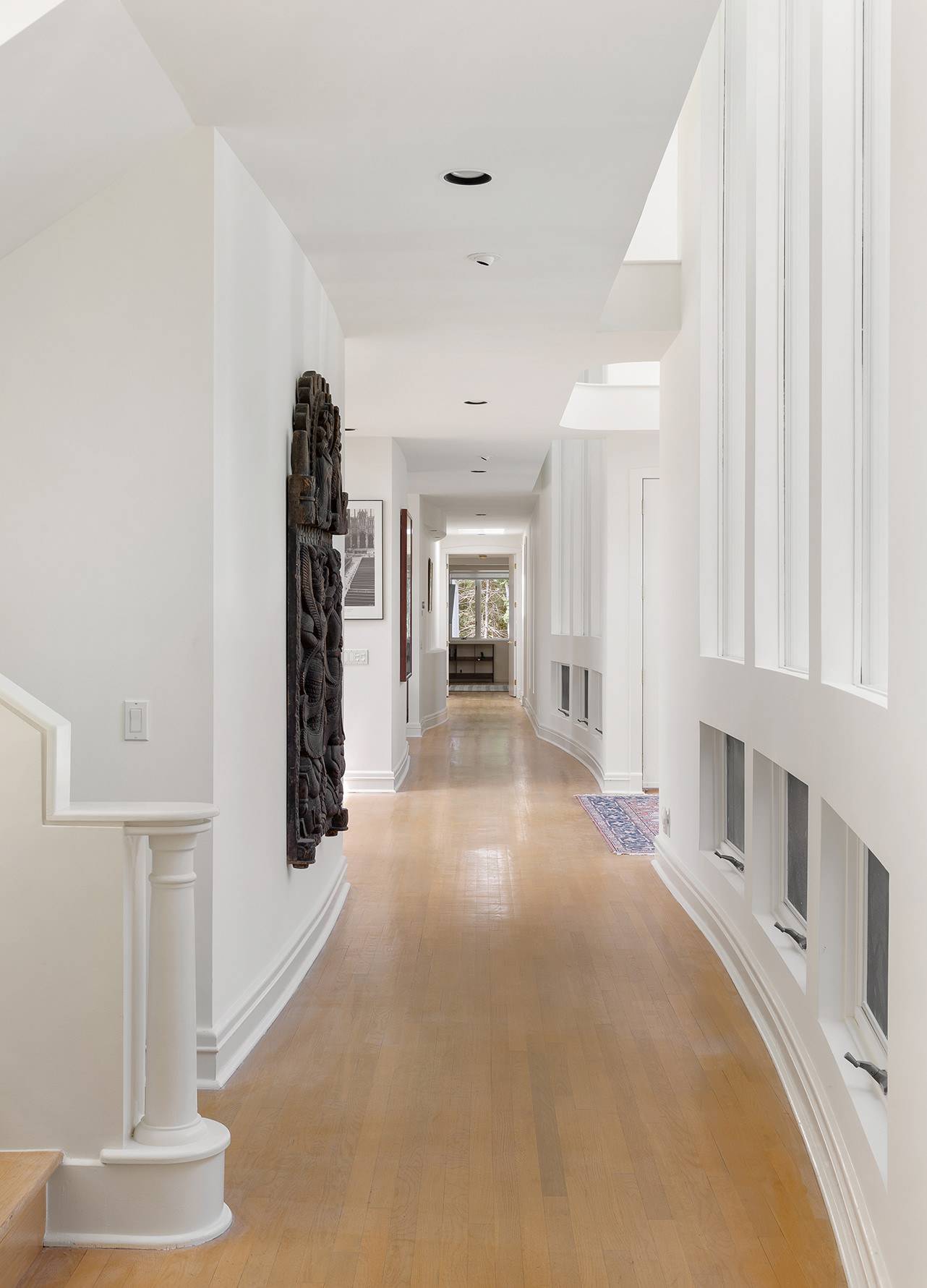 147 Old Northwest Road East Hampton, NY 11937 - Photo 18 of 33 a view of a hallway with furniture and a window