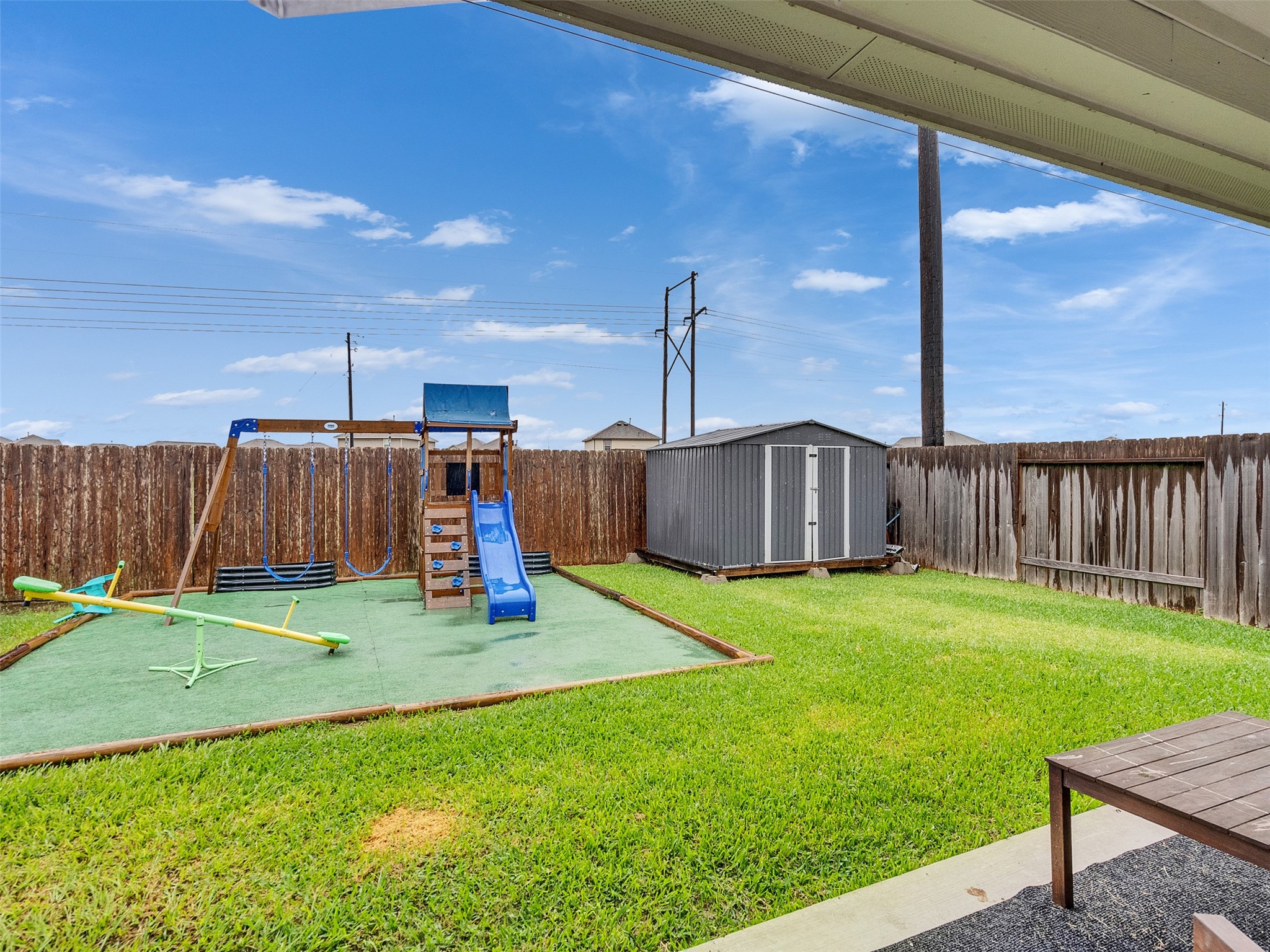 8719 Willet Street Baytown, TX 77521 - Photo 39 of 42 a backyard of a house