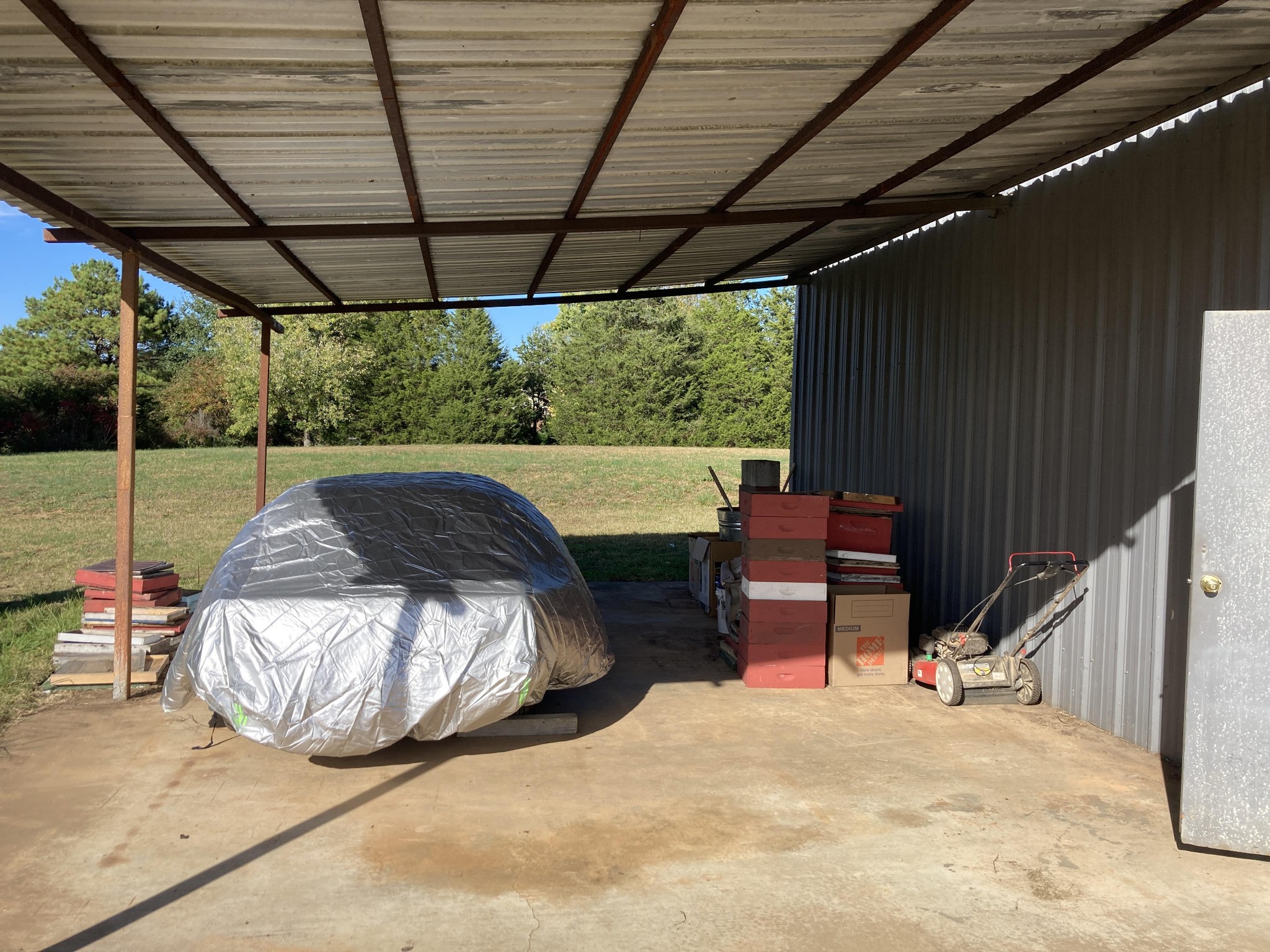 0 Second Creek Road Five Points, TN 38457 - Photo 8 of 17 a roof deck with table and chairs under an umbrella