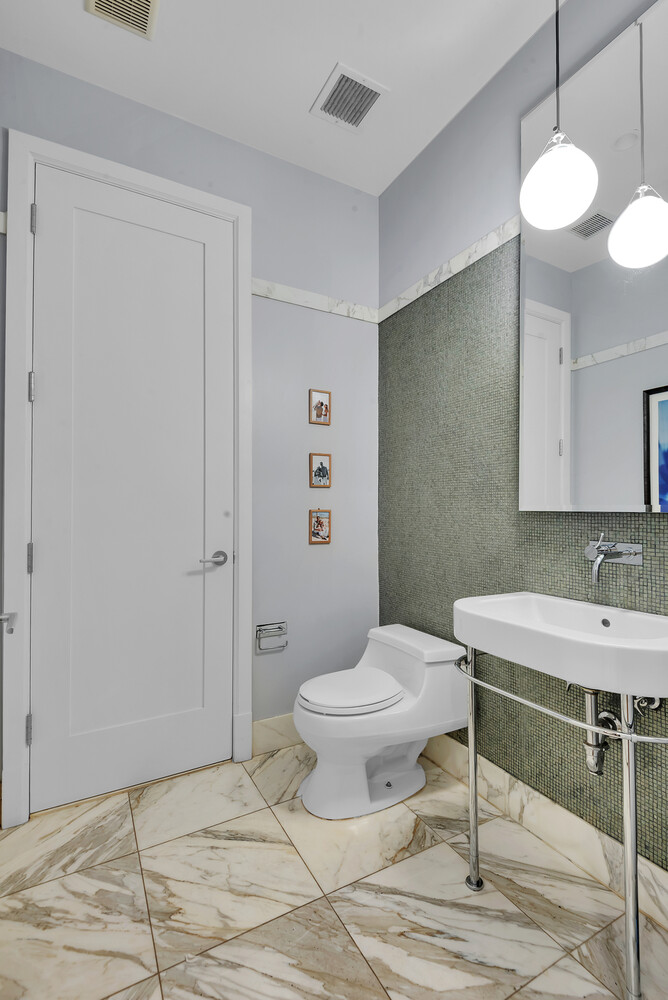 260 Park Avenue South, Unit 2E Manhattan, NY 10010 - Photo 14 of 20 a bathroom with a sink toilet and shower