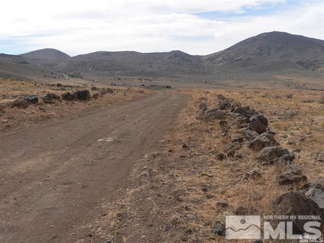 0 Jaybird Road, Unit 3 Reno, NV 89510 - Photo 3 of 9 a view of a dry field with mountains in the background