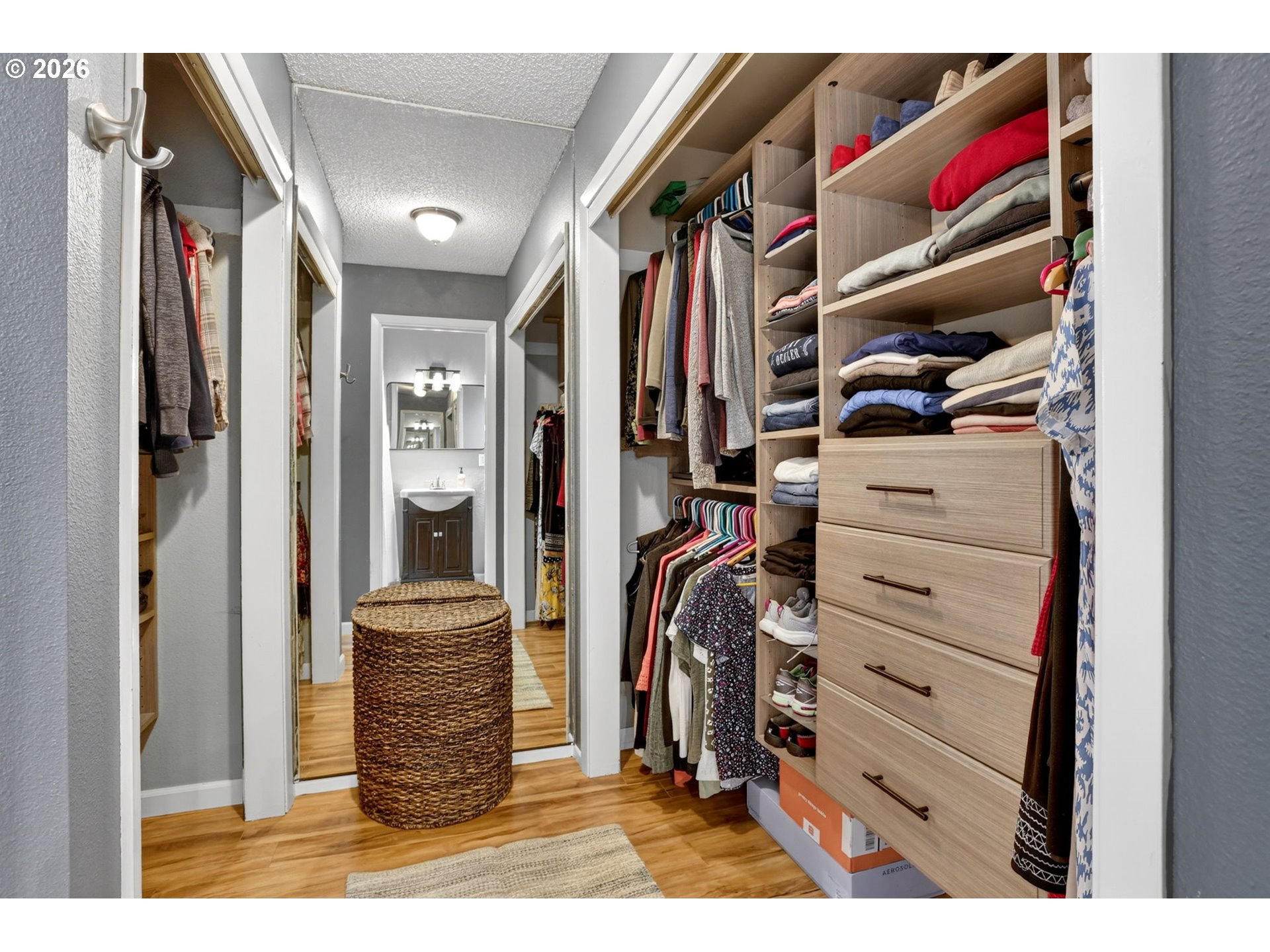 1776 Southeast 114th Place Portland, OR 97216 - Photo 34 of 47 a view of walk in closet with clothes and shoes