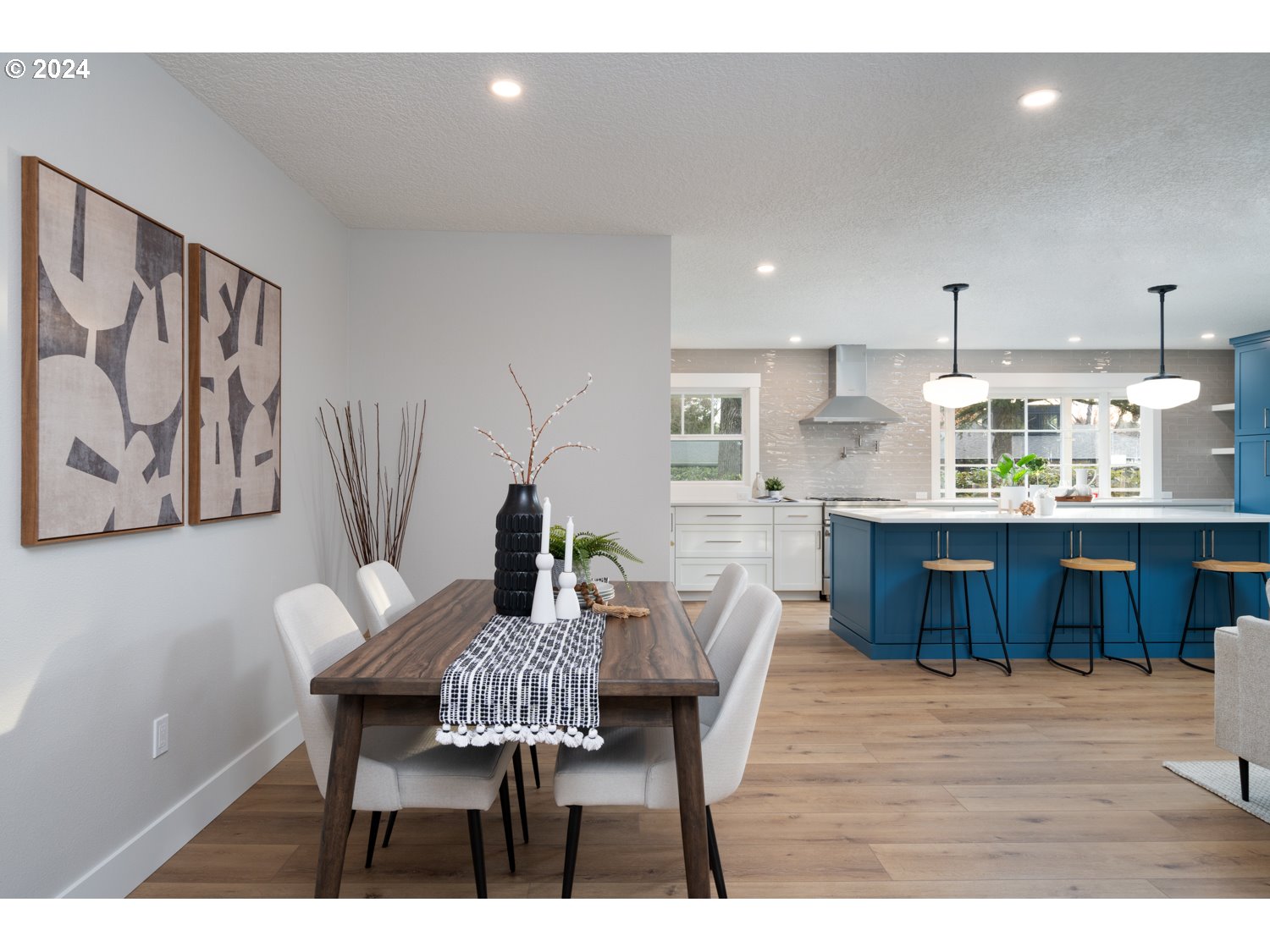 8889 Southwest Becker Drive Portland, OR 97223 - Photo 15 of 32 a dining room with furniture and wooden floor
