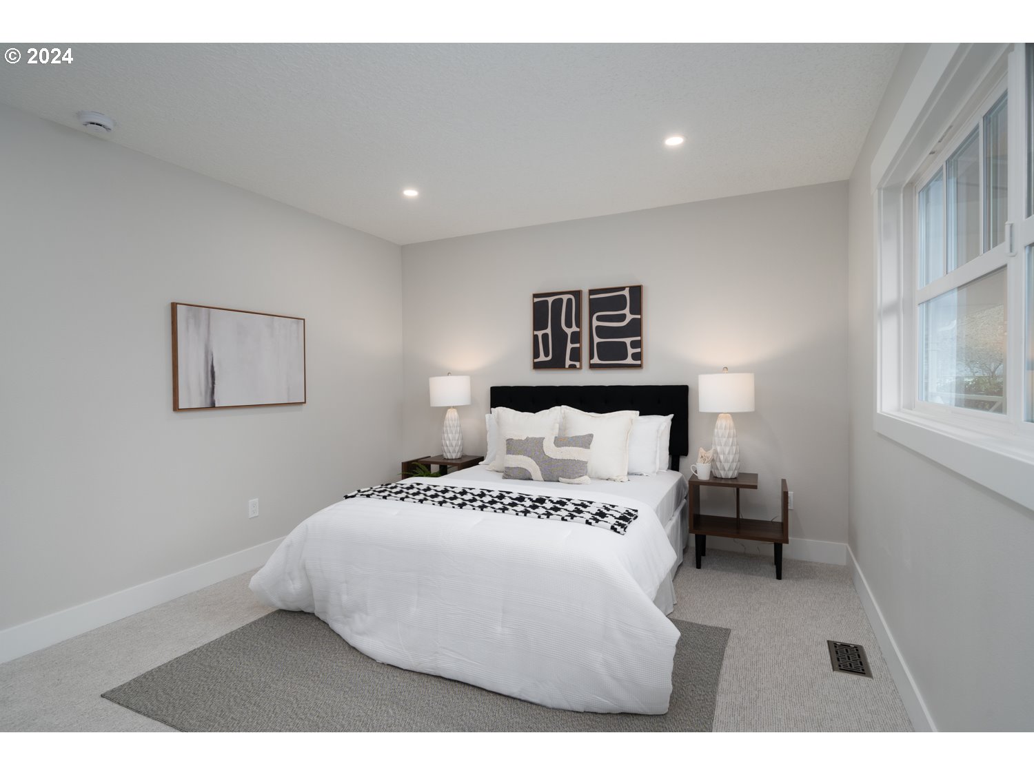 8889 Southwest Becker Drive Portland, OR 97223 - Photo 18 of 32 a bedroom with a bed and a painting