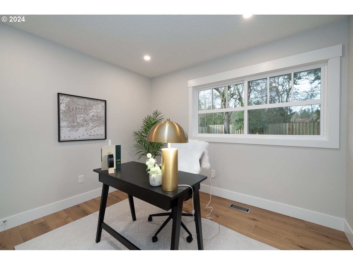 8889 Southwest Becker Drive Portland, OR 97223 - Photo 27 of 32 a view of a workspace room with furniture and a window