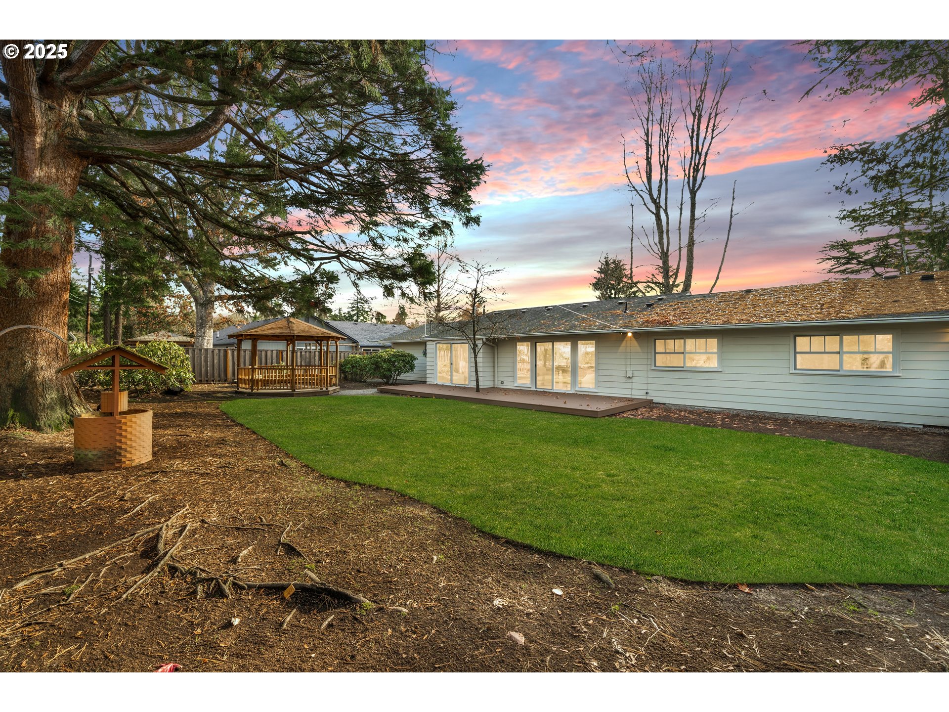 8889 Southwest Becker Drive Portland, OR 97223 - Photo 30 of 32 a view of a house with a yard