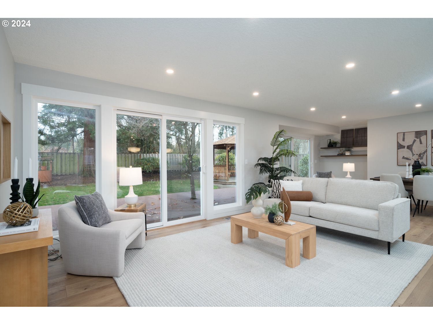 8889 Southwest Becker Drive Portland, OR 97223 - Photo 4 of 32 a living room with furniture and a large window
