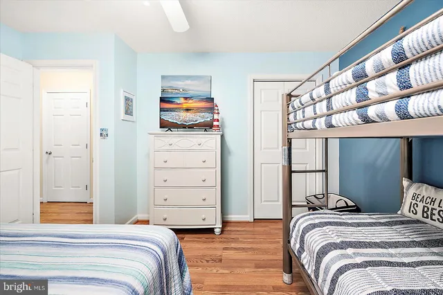 a bedroom with a bed and a cabinets