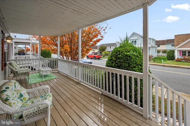 a view of balcony with furniture
