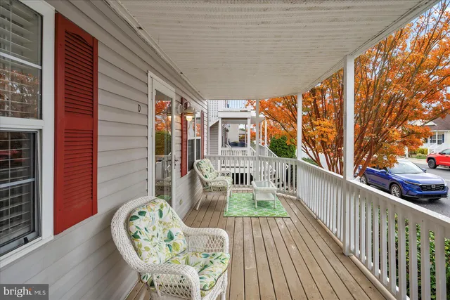 a view of balcony with furniture