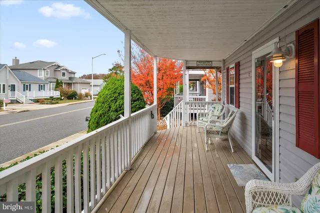 a view of a balcony with chairs