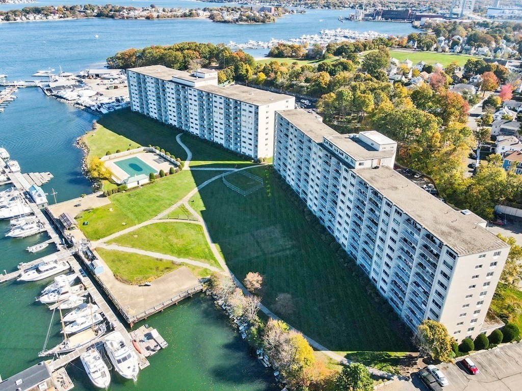 100 Cove Way, Unit 608 Quincy, MA 02169 - Photo 2 of 26 a view of a balcony with wooden floor and lake view