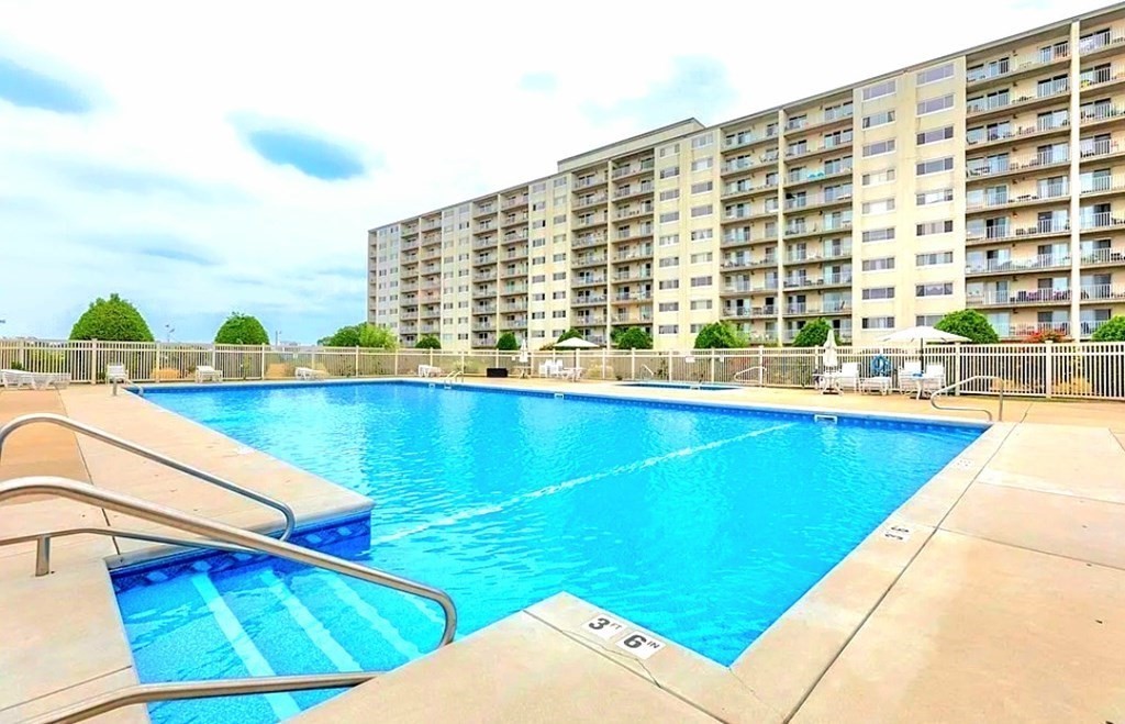 100 Cove Way, Unit 608 Quincy, MA 02169 - Photo 22 of 26 a view of swimming pool with outdoor seating