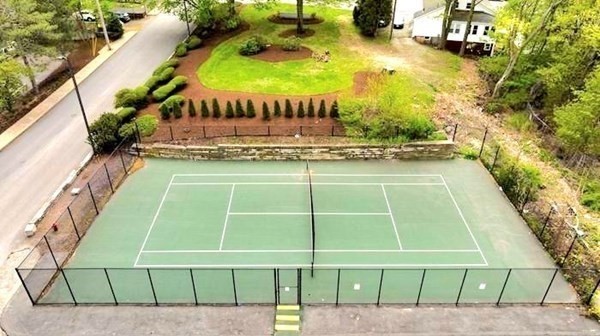 100 Cove Way, Unit 608 Quincy, MA 02169 - Photo 23 of 26 a view of a swimming pool with an outdoor space and seating area