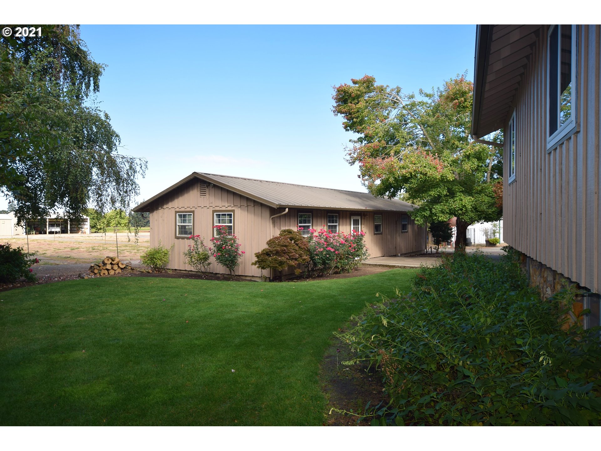 10107 South Kraxberger Road Canby, OR 97013 - Photo 3 of 32 a view of a house with a yard