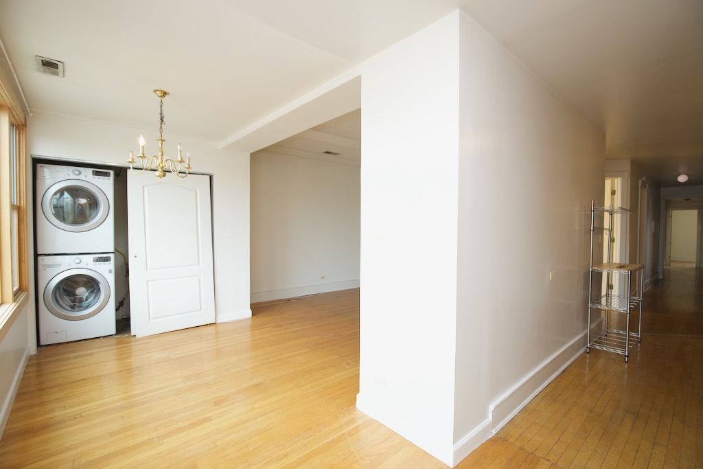 6717 North Sheridan Road, Unit 3S Chicago, IL 60626 - Photo 5 of 20 a view of a storage & utility room with washer and dryer