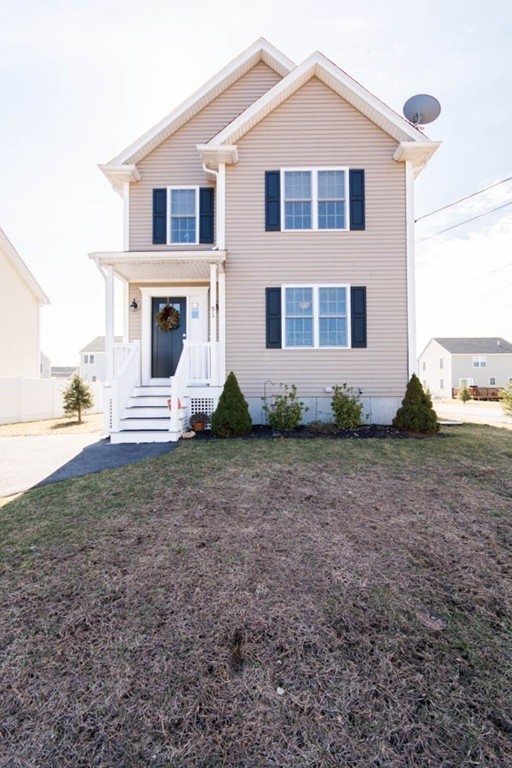 91 Bronson Street Fall River, MA 02721 - Photo 6 of 30 a view of a house with a yard