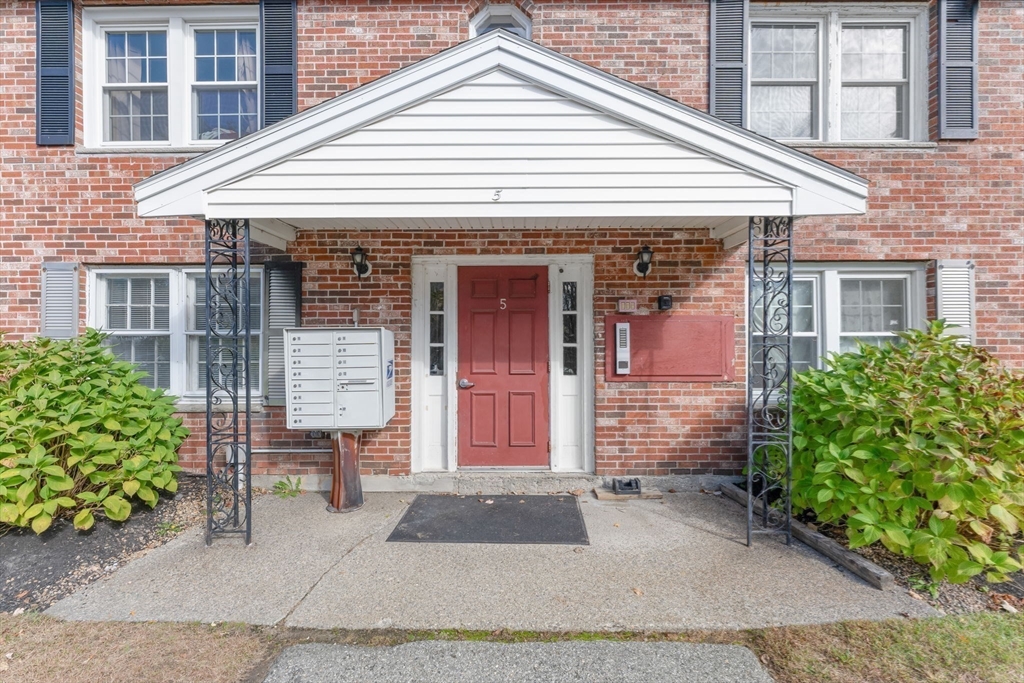 5 Elm Street, Unit 1 Acton, MA 01720 - Photo 7 of 30 a front view of a house