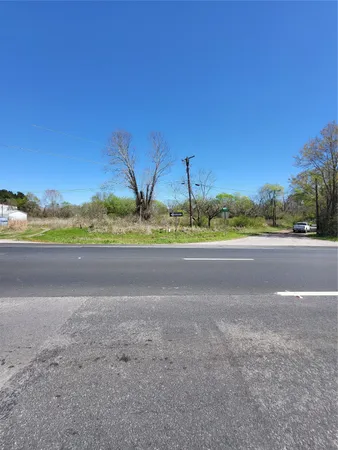 a view of a road and a yard
