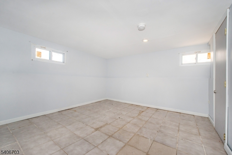 86 Watsessing Avenue, Unit 1 Bloomfield, NJ 07003 - Photo 16 of 21 wooden floor in a empty room