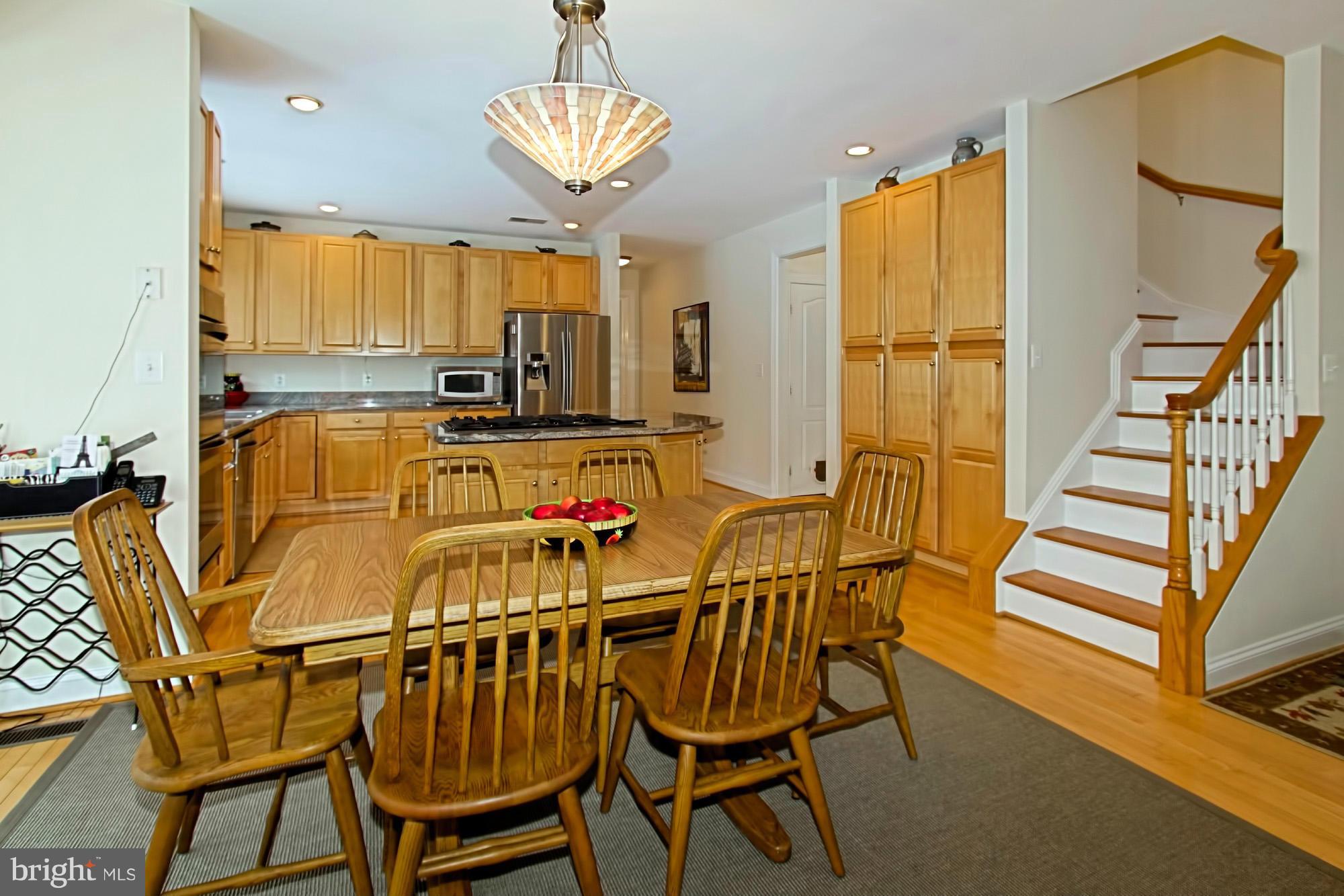 537 Utterback Store Road Great Falls, VA 22066 - Photo 10 of 30 Breakfast area and back staircase