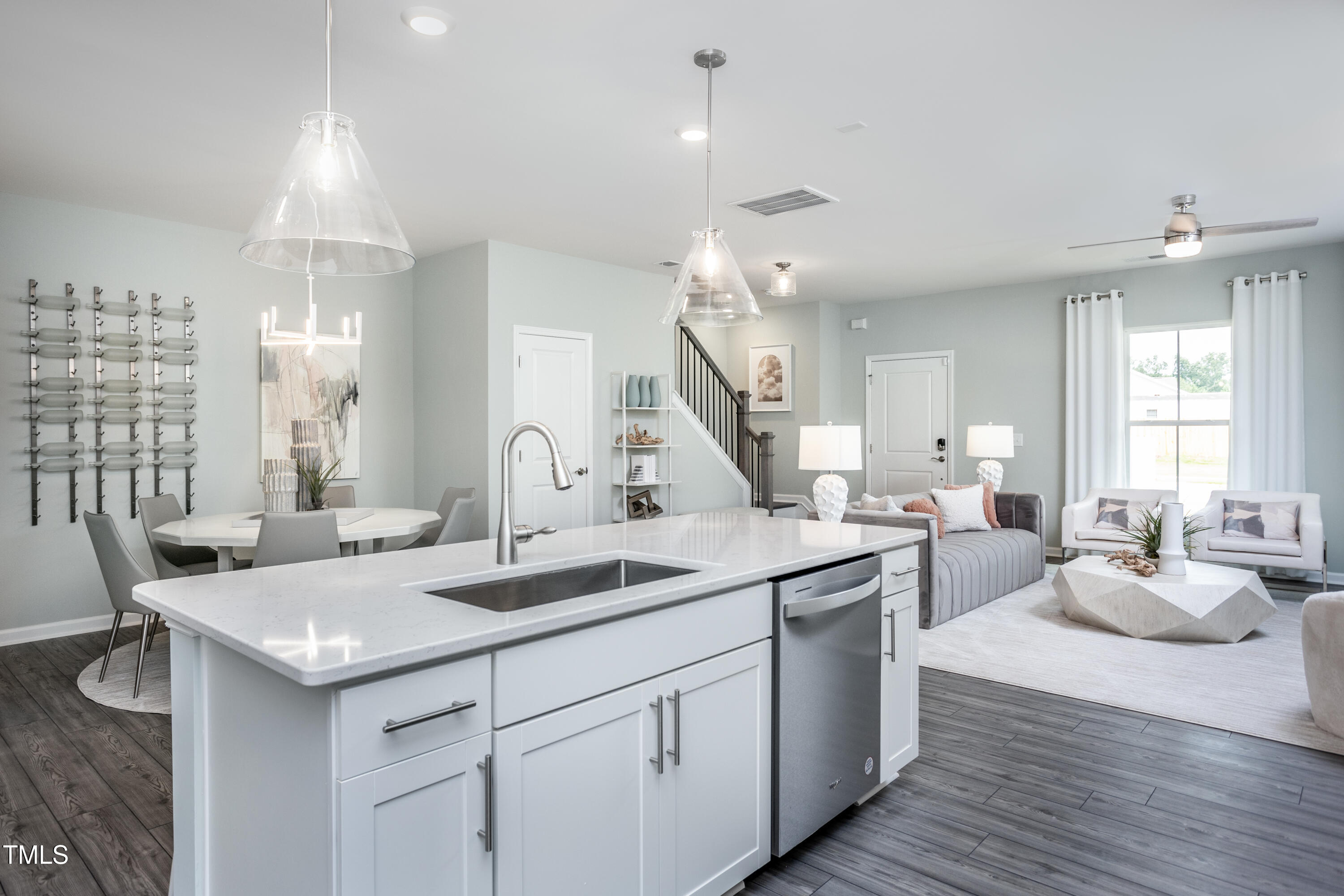 2903 Denson Road Fuquay-Varina, NC 27526 - Photo 5 of 19 a kitchen with a sink stove and cabinets