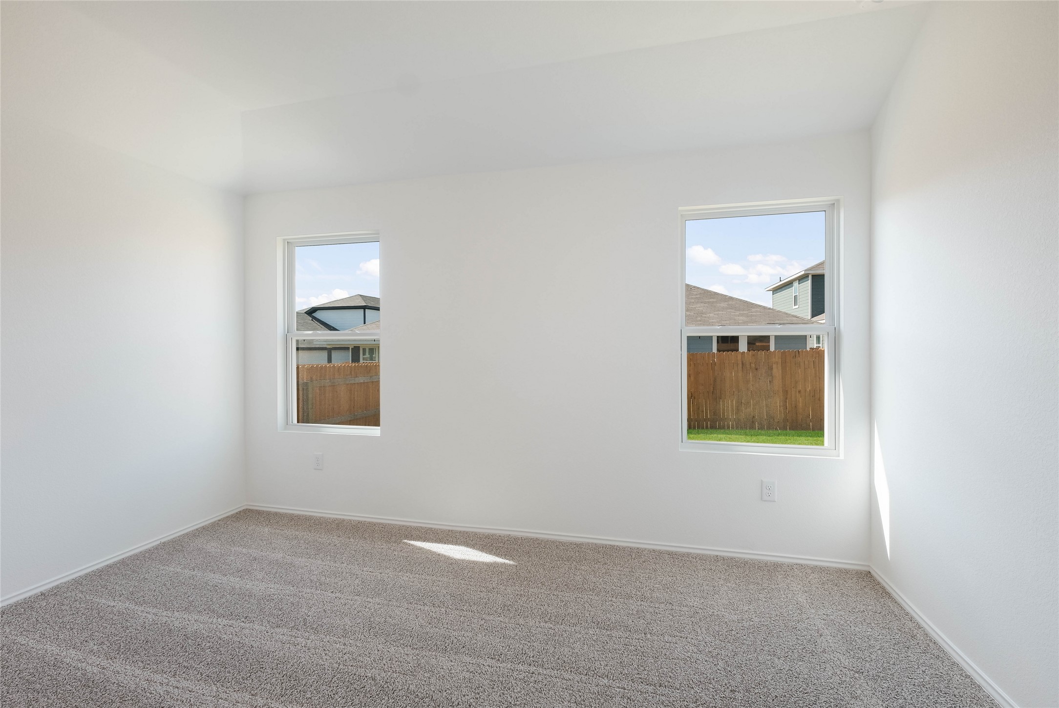 12204 Douglas Fir Circle Mustang Ridge, TX 78610 - Photo 10 of 17 an empty room with a window