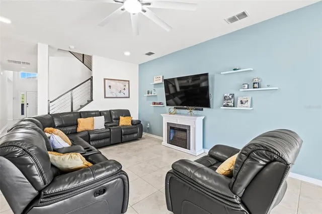 a bathroom with a granite countertop sink a mirror and a vanity