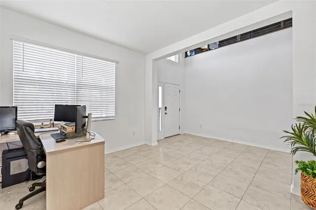 a front view of building with yard