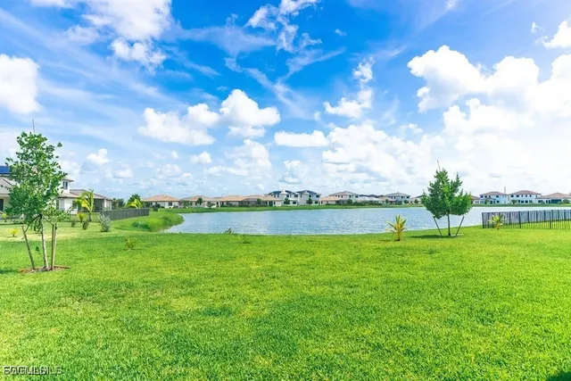 a view of a golf course with a lake