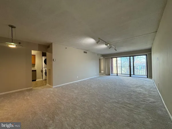 a view of livingroom and a garage