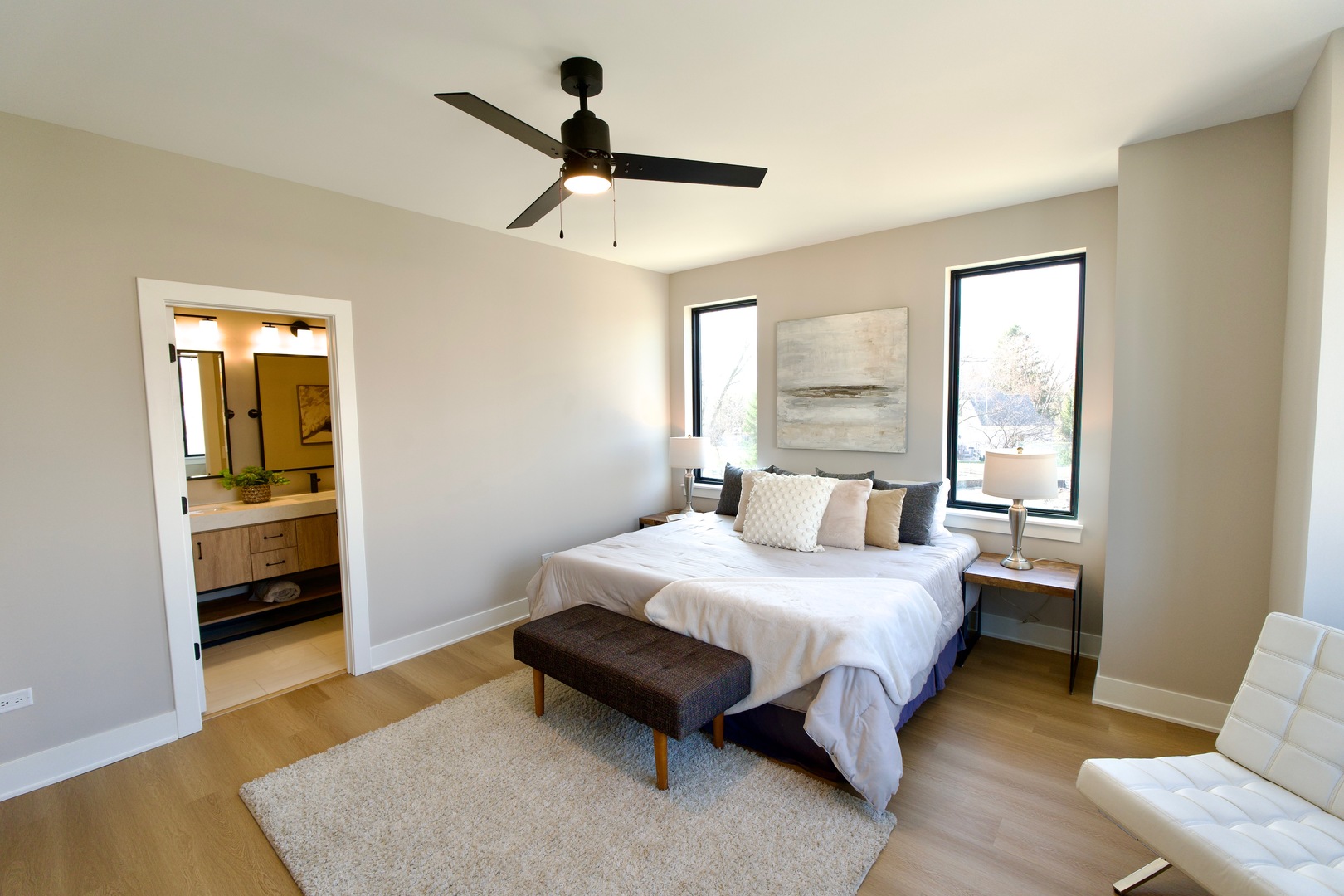 175 Pointe Drive, Unit 175 Northbrook, IL 60062 - Photo 11 of 23 a bedroom with a bed and a couch