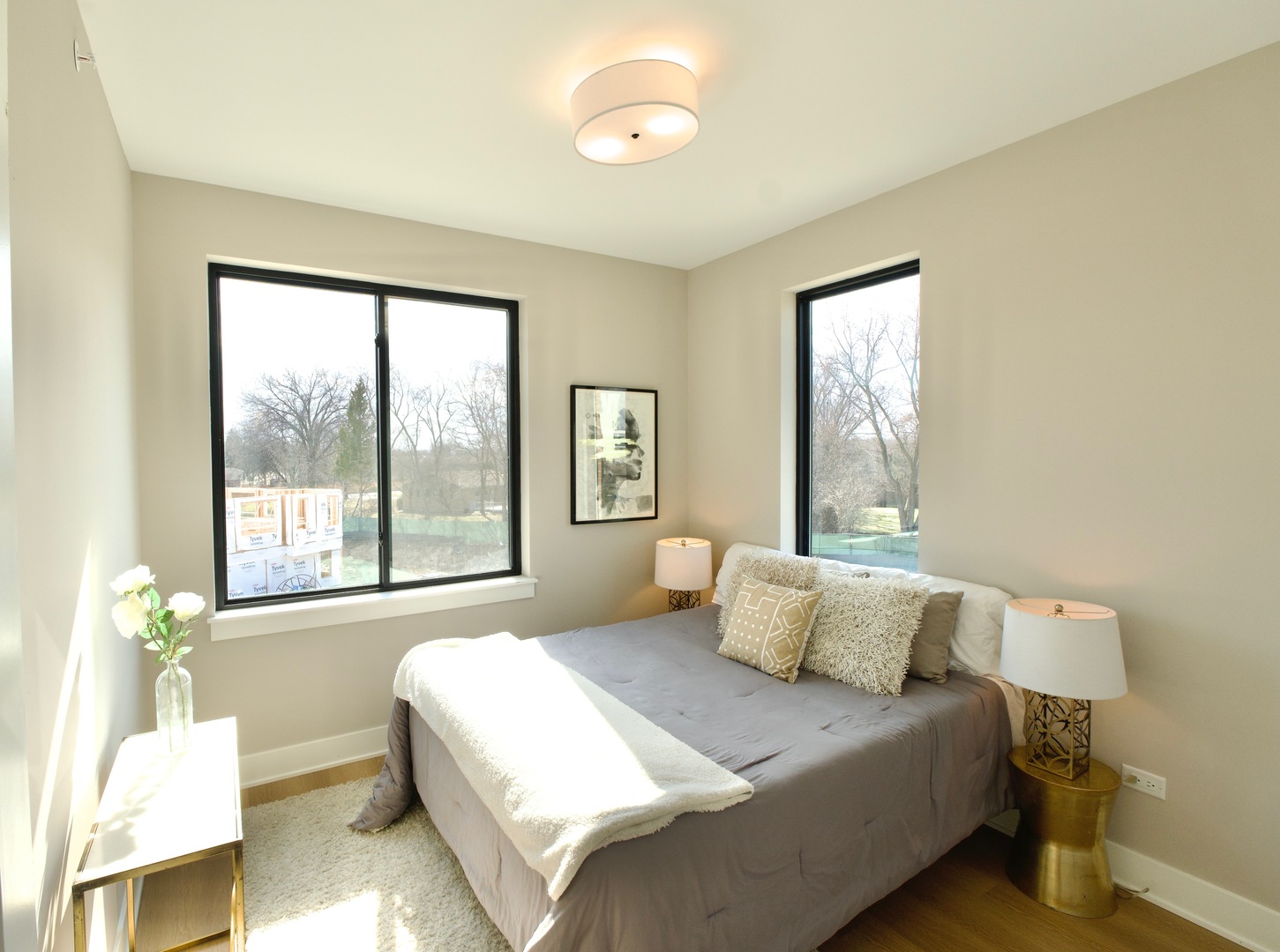 175 Pointe Drive, Unit 175 Northbrook, IL 60062 - Photo 16 of 23 a bedroom with a bed and a window