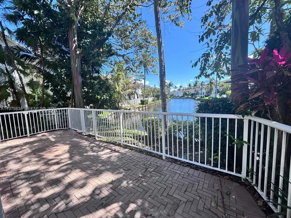 a view of a wooden fence