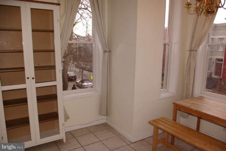 401 E Street Northeast Washington, DC 20002 - Photo 13 of 30 Upstairs unit has bright table space kitchen