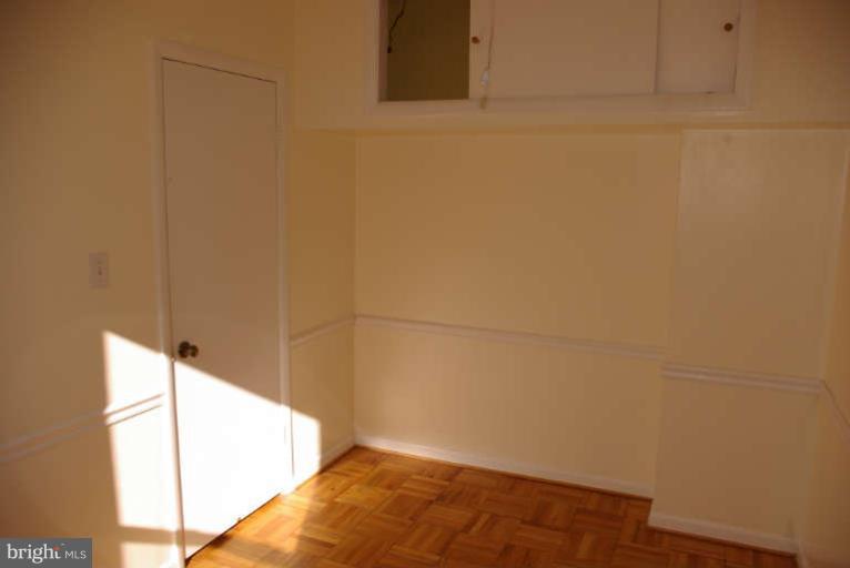 401 E Street Northeast Washington, DC 20002 - Photo 26 of 30 Upstairs unit's sunny rear second bedroom