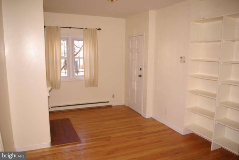 401 E Street Northeast Washington, DC 20002 - Photo 5 of 30 1st flr 1BR unit living area toward bay
