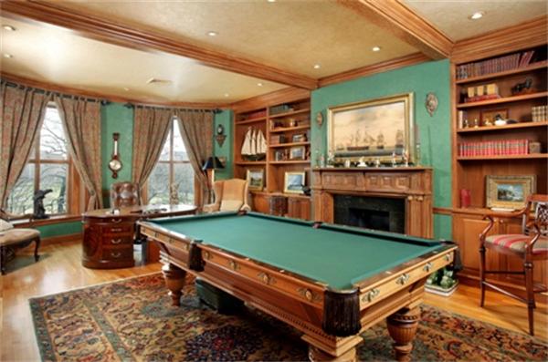 53 Beacon Street, Unit PH Boston, MA 02108 - Photo 7 of 10 a room with pool table two windows and a fireplace