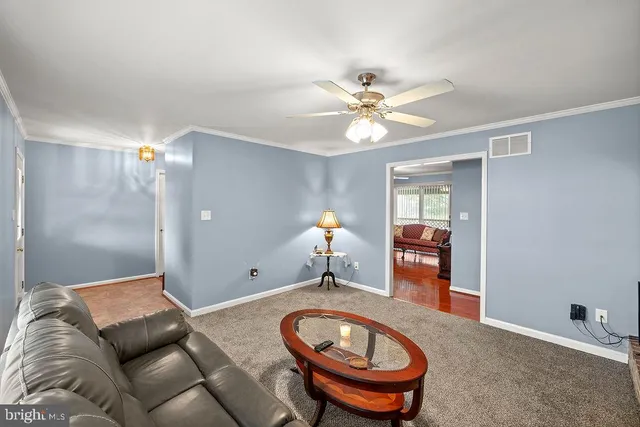 a kitchen with a sink a stove and cabinets
