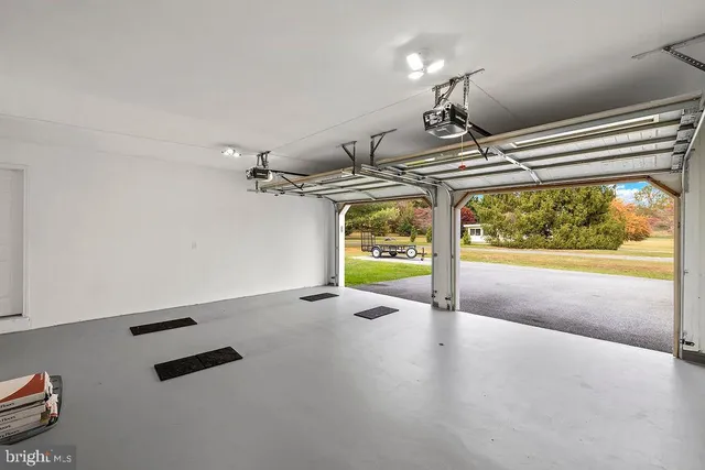 an aerial view of a house with outdoor space