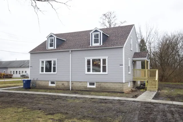 a house that has a large tree in it