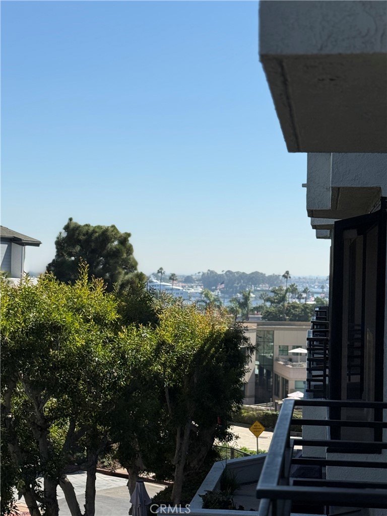 a view of a balcony with lake view and mountain view