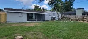 a house with a tree in front of it
