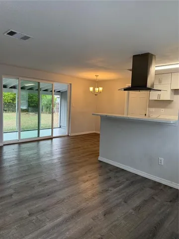 a view of a livingroom with a flat screen tv