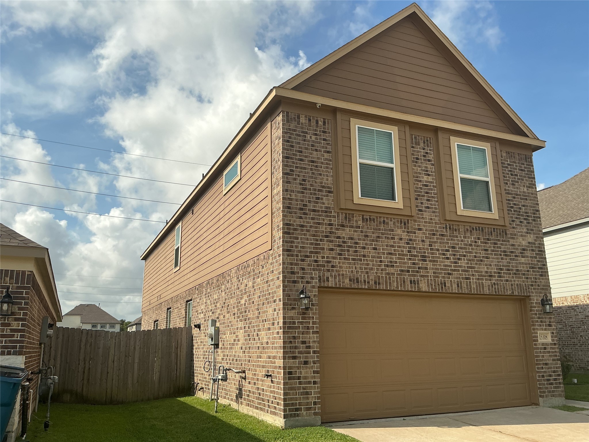 15318 Laceleaf Trail Houston, TX 77044 - Photo 2 of 12 a view of a house with wooden fence